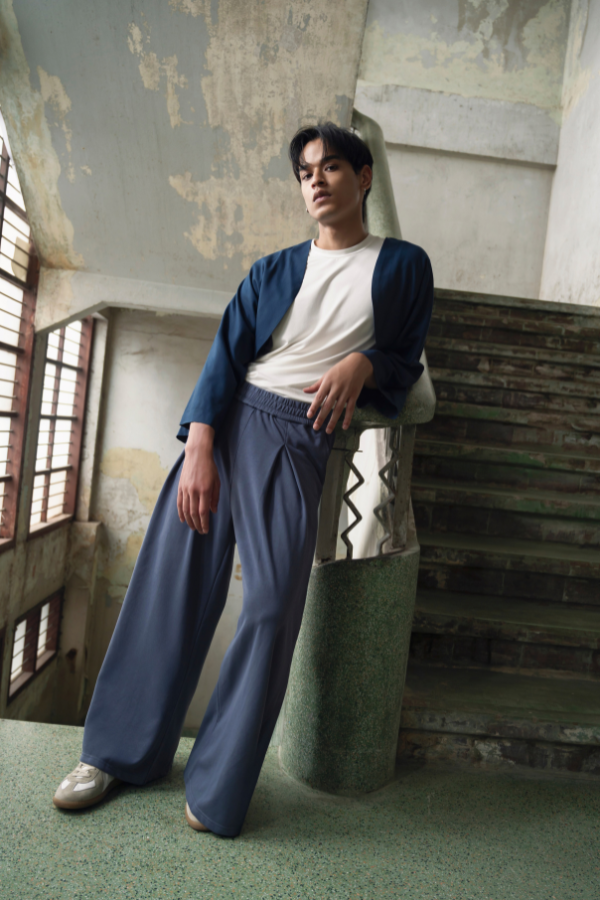 Finix FLOW Box Pleat Wide Leg Joggers in Shadow Blue – front view, model posing.