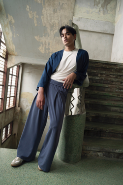 Finix FLOW Box Pleat Wide Leg Joggers in Shadow Blue – front view, model posing.