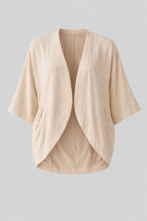 Oat white kimono-style cocoon shape jacket on a light gray background
